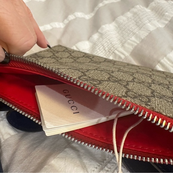 Gucci wristlet small clutch. Never worn. - Picture 2 of 3